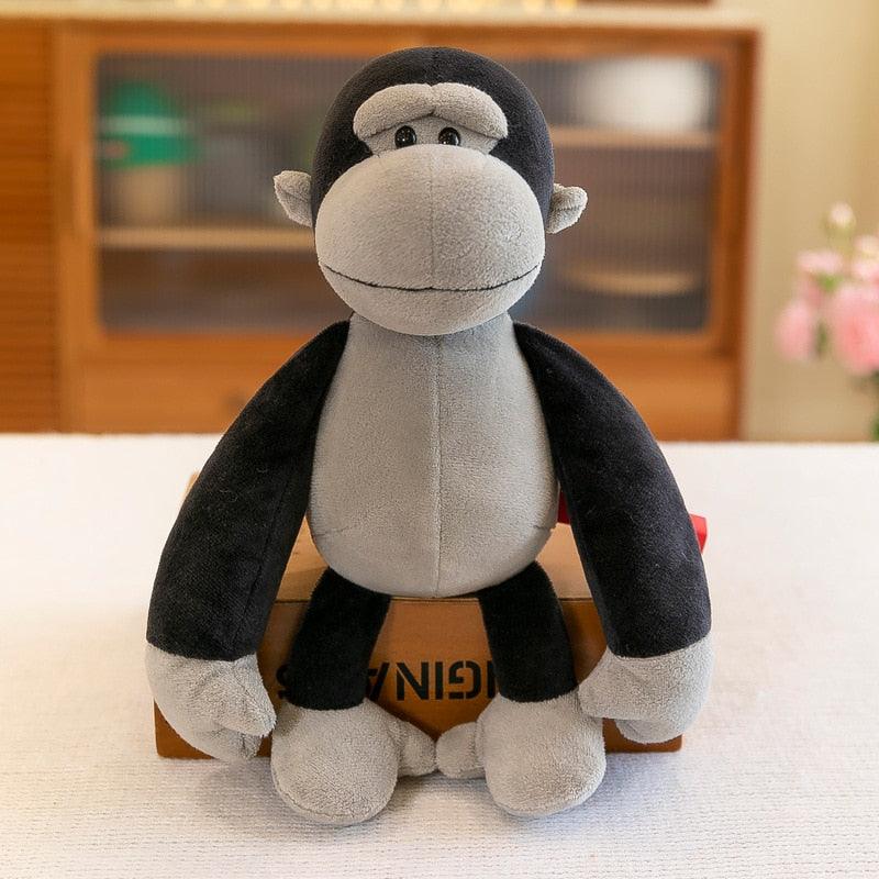doudou-bebe-singe-peluchy-1.jpg - Peluche carlin